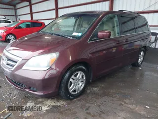 2007 Honda Odyssey EX with VIN 5FNRL38497B118079, listed as a IAAI auction lot 41721735 with 223,222 mi miles. Bid and sale history available at carsss.com. Image 2.