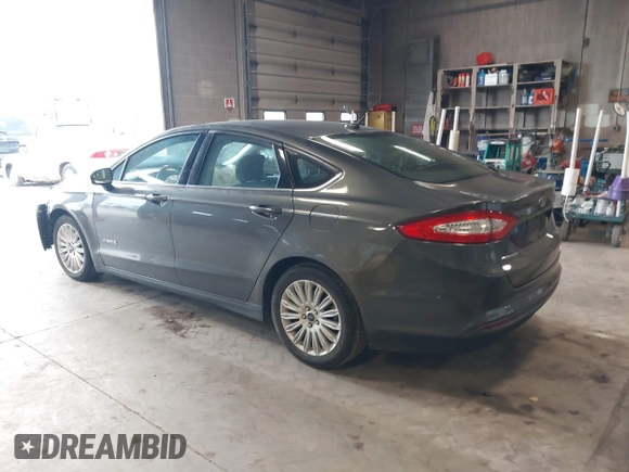 2015 Ford Fusion S Hybrid with VIN 3FA6P0UU8FR178675, listed as a IAAI auction lot 42104712 with 129,998 mi miles. Bid and sale history available at carsss.com. Image 3.