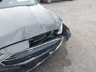 2018 Ford Fusion Titanium z VIN 3FA6P0K9XJR160993, wystawiony jako IAAI lot #41938148 z przebiegiem 137 410 mil mil oraz . Historia ofert i sprzedaży dostępna na DreamBid. Obrazek 6.