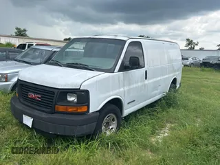 2003 GMC Savana Cargo z VIN 1GTHG35U431113170, wystawiony jako Copart lot #59030535 z przebiegiem 293 807 mil mil oraz Tytuł czysty. Historia ofert i sprzedaży dostępna na DreamBid. Obrazek 2.