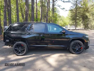 2023 Chevrolet Traverse Premier with VIN 1GNERKKW8PJ334863, listed as a IAAI auction lot 42060557 with 24,108 mi miles and . Bid and sale history available at DreamBid. Image 14.