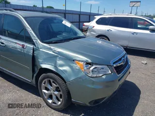 2016 Subaru Forester Touring with VIN JF2SJAVCXGH490507, listed as a IAAI auction lot 42070715 with 98,456 mi miles and . Bid and sale history available at DreamBid. Image 6.