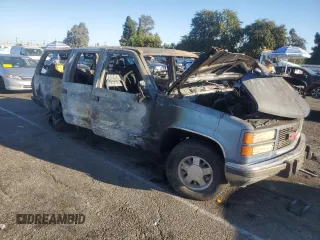 1994 GMC Suburban z VIN 1GKEC16K3RJ769051, wystawiony jako Copart lot #74576864 z przebiegiem Nie podano mil oraz Nie do naprawy • Non repairable. Historia ofert i sprzedaży dostępna na DreamBid. Obrazek 4.