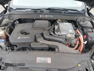 2016 Ford Fusion SE Hybrid with VIN 3FA6P0LU5GR356433, listed as a IAAI auction lot 41799204 with 157,670 mi miles. Bid and sale history available at carsss.com. Image 10.