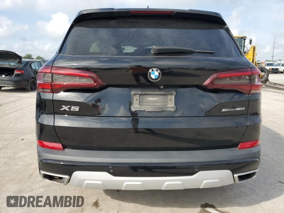 2021 BMW X5 sDrive40i z VIN 5UXCR4C00M9E01511, wystawiony jako Copart lot #54236305 z przebiegiem Nie podano mil oraz Szkoda całkowita • Salvage title. Historia ofert i sprzedaży dostępna na DreamBid. Obrazek 6.