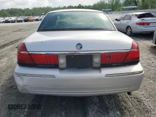 2001 Mercury Grand Marquis LS z VIN 2MEFM75W31X704781, wystawiony jako Copart lot #54613735 z przebiegiem 191 323 mil mil oraz Szkody całkowita. Historia ofert i sprzedaży dostępna na DreamBid. Obrazek 6.