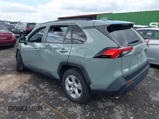 2019 Toyota RAV4 XLE with VIN JTMW1RFV7KD035614, listed as a IAAI auction lot 41970954 with 60,377 mi miles and . Bid and sale history available at DreamBid. Image 3.