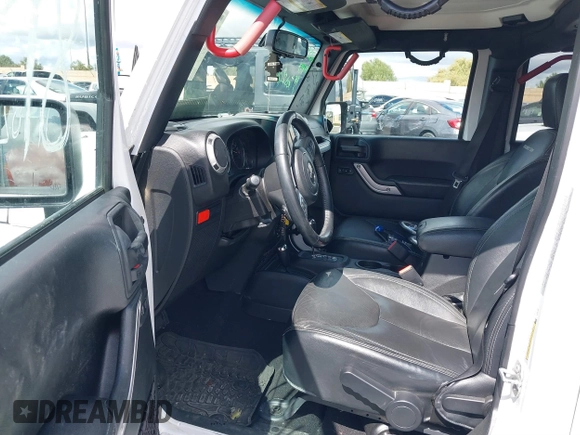2016 Jeep Wrangler Unlimited Rubicon with VIN 1C4HJWFG7GL254143, listed as a IAAI auction lot 41781962 with 114,435 mi miles and . Bid and sale history available at DreamBid. Image 5.