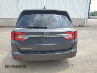2018 Honda Odyssey with VIN 5FNRL6H49JB504977, listed as a Copart auction lot 60905615 with 180,464 mi miles and Clean title. Bid and sale history available at DreamBid. Image 6.