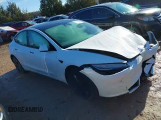 2025 Tesla Model 3 Long Range with VIN 5YJ3E1EA6SF890367, listed as a IAAI auction lot 41199706 with 3,106 mi miles. Bid and sale history available at carsss.com. Image 1.