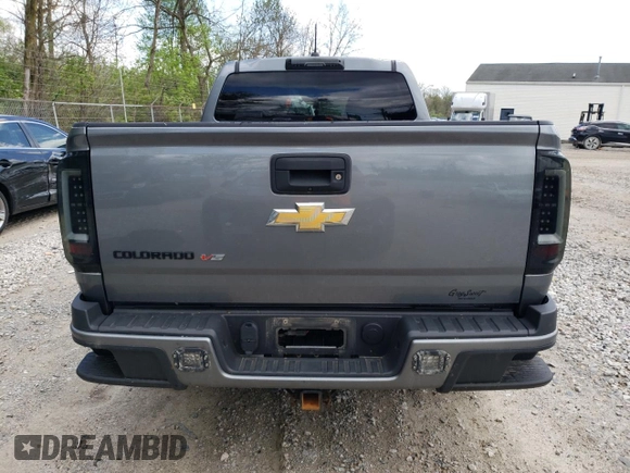 2019 Chevrolet Colorado 4WD Work Truck z VIN 1GCGTBEN6K1350977, wystawiony jako Copart lot #54855495 z przebiegiem 179 285 mil mil oraz Szkoda całkowita • Salvage title. Historia ofert i sprzedaży dostępna na DreamBid. Obrazek 6.