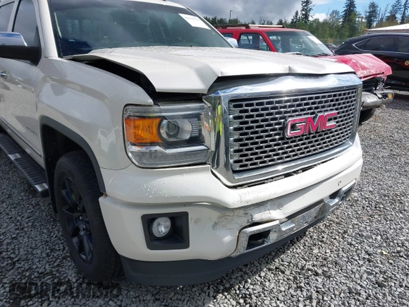 2014 GMC Sierra 1500 Denali z VIN 3GTU2WEJXEG527496, wystawiony jako IAAI lot #42211521 z przebiegiem 151 974 mil mil oraz . Historia ofert i sprzedaży dostępna na DreamBid. Obrazek 6.