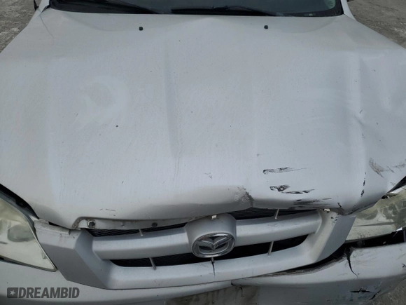2006 Mazda Tribute i with VIN 4F2YZ02Z56KM29507, listed as a Copart auction lot 43687275 with 192,478 mi miles and Salvage Title. Bid and sale history available at carsss.com. Image 12.