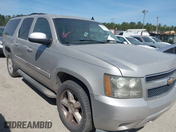 2007 Chevrolet Suburban LS with VIN 1GNFC16087J239886, listed as a IAAI auction lot 41874548 with 303,014 mi miles and . Bid and sale history available at DreamBid. Image 1.