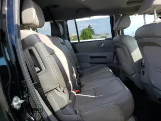 2013 Honda Pilot EX-L z VIN 5FNYF4H57DB045372, wystawiony jako Copart lot #54773425 z przebiegiem 147 015 mil mil oraz Szkoda całkowita • Salvage title. Historia ofert i sprzedaży dostępna na DreamBid. Obrazek 11.