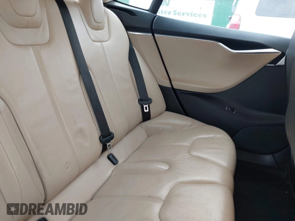 2013 Tesla Model S with VIN 5YJSA1CG0DFP14545, listed as a IAAI auction lot 41806844 with Not Provided miles. Bid and sale history available at carsss.com. Image 8.