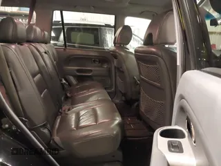 2007 Honda Pilot EX-L with VIN 5FNYF18677B017230, listed as a IAAI auction lot 41727853 with 257,527 mi miles and . Bid and sale history available at DreamBid. Image 8.