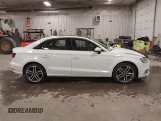 2019 Audi A3 Premium with VIN WAUAUGFF8K1015742, listed as a IAAI auction lot 41033603 with 89,279 mi miles and . Bid and sale history available at DreamBid. Image 13.