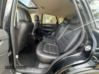 2020 Mazda CX-5 Grand Touring with VIN JM3KFADM8L0785373, listed as a Copart auction lot 50829175 with 135,736 mi miles and Clean Title. Bid and sale history available at DreamBid. Image 12.
