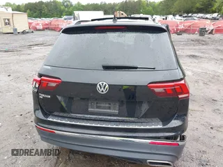 2021 Volkswagen Tiguan SE with VIN 3VV3B7AX6MM021502, listed as a IAAI auction lot 42243705 with 60,988 mi miles and . Bid and sale history available at DreamBid. Image 15.