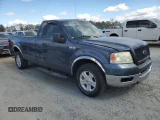 2004 Ford F-150 XL with VIN 1FTPF12584NC32561, listed as a Copart auction lot 74464844 with 250,379 mi miles and Salvage title. Bid and sale history available at DreamBid. Image 4.