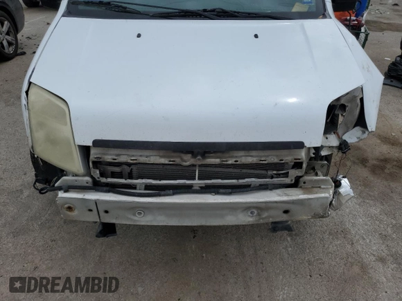 2010 Ford Transit Connect XLT with VIN NM0KS6BNXAT000034, listed as a Copart auction lot 54598985 with 133,444 mi miles and Salvage title. Bid and sale history available at DreamBid. Image 12.