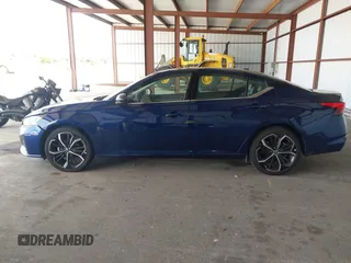 2023 Nissan Altima SR z VIN 1N4BL4CV3PN367086, wystawiony jako IAAI lot #42377083 z przebiegiem 52 417 mil mil oraz . Historia ofert i sprzedaży dostępna na DreamBid. Obrazek 14.