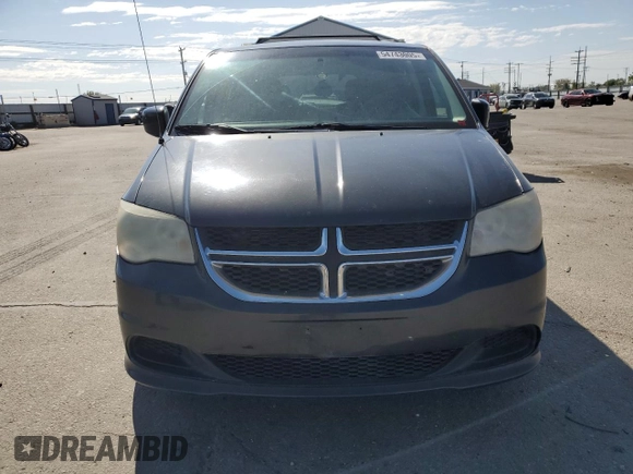 2012 Dodge Grand Caravan SXT with VIN 2C4RDGCG8CR204035, listed as a Copart auction lot 54743005 with 187,533 mi miles and Clean Title. Bid and sale history available at DreamBid. Image 5.
