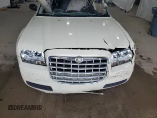 2005 Chrysler 300 300 z VIN 2C3AA43R35H584162, wystawiony jako Copart lot #57164895 z przebiegiem Nie podano mil oraz Szkoda całkowita • Salvage title. Historia ofert i sprzedaży dostępna na DreamBid. Obrazek 11.