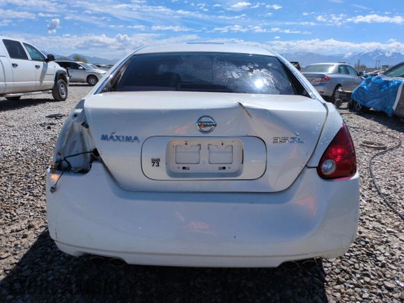 2004 Nissan Maxima SE with VIN 1N4BA41E24C883438, listed as a Copart auction lot 56175265 with 122,747 mi miles and Salvage title. Bid and sale history available at DreamBid. Image 6.