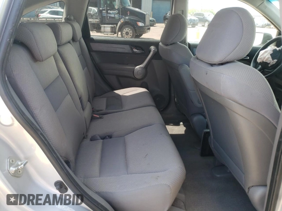 2009 Honda CR-V LX z VIN 5J6RE383X9L035529, wystawiony jako Copart lot #57875445 z przebiegiem 122 651 mil mil oraz Szkoda całkowita • Salvage title. Historia ofert i sprzedaży dostępna na DreamBid. Obrazek 11.