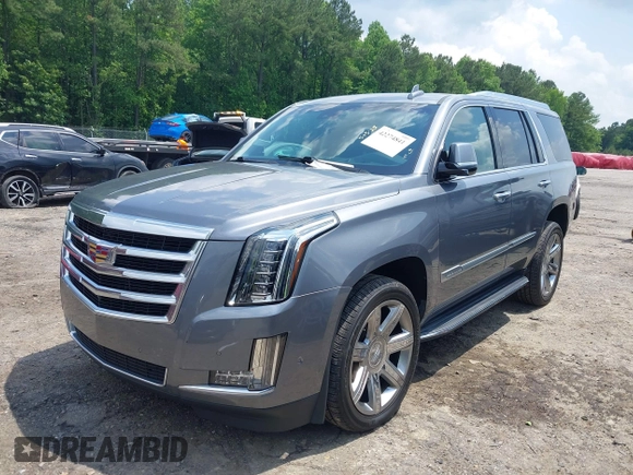 2020 Cadillac Escalade Luxury z VIN 1GYS3BKJ0LR116410, wystawiony jako IAAI lot #42274841 z przebiegiem 75 513 mil mil oraz . Historia ofert i sprzedaży dostępna na DreamBid. Obrazek 19.