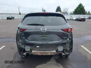 2020 Mazda CX-5 Grand Touring with VIN JM3KFBDM4L0829861, listed as a IAAI auction lot 41826250 with 62,091 mi miles and . Bid and sale history available at carsss.com. Image 17.