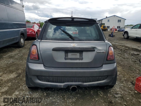 2007 MINI Hardtop S with VIN WMWMF73557TL90986, listed as a Copart auction lot 57850585 with 185,423 mi miles and Salvage title. Bid and sale history available at DreamBid. Image 6.