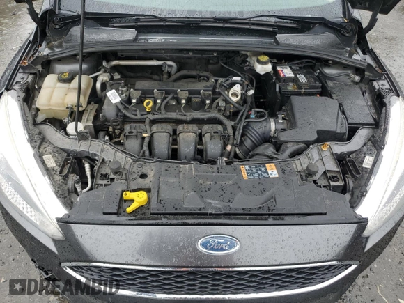 2018 Ford Focus SE z VIN 1FADP3F21JL285417, wystawiony jako Copart lot #56936965 z przebiegiem Nie podano mil oraz Czysty tytuł • Clean title. Historia ofert i sprzedaży dostępna na DreamBid. Obrazek 11.