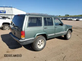 2000 Jeep Cherokee with VIN 1J4FF48S0YL198802, listed as a Copart auction lot 59996915 with 249,756 mi miles and Salvage title. Bid and sale history available at DreamBid. Image 3.