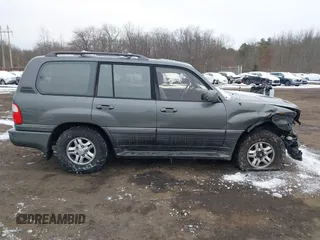 2000 Lexus LX 470 with VIN JT6HT00W9Y0096647, listed as a IAAI auction lot 41376347 with 231,916 mi miles and . Bid and sale history available at DreamBid. Image 13.