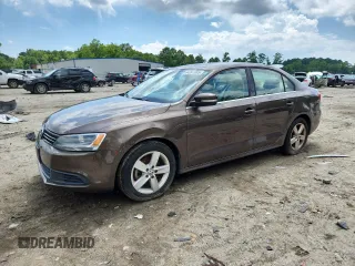 2014 Volkswagen Jetta TDI w/Premium with VIN 3VW3L7AJ9EM303218, listed as a Copart auction lot 64261985 with 187,371 mi miles and Clean title. Bid and sale history available at DreamBid. Image 1.