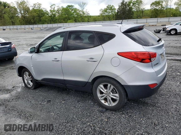 2013 Hyundai Tucson GLS with VIN KM8JU3AC1DU709937, listed as a Copart auction lot 52716295 with 181,711 mi miles and Salvage Title. Bid and sale history available at carsss.com. Image 2.