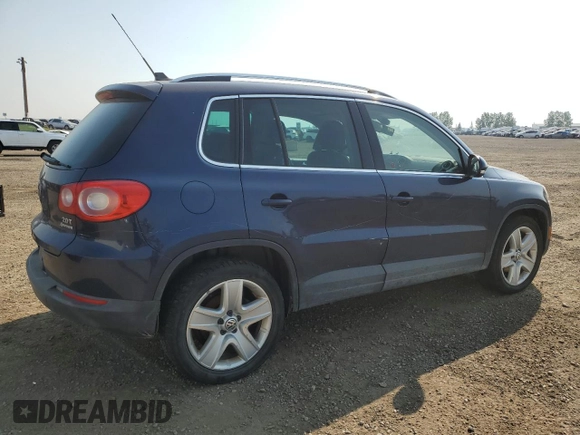 2011 Volkswagen Tiguan SEL with VIN WVGBV7AX1BW504132, listed as a Copart auction lot 64467484 with Not Provided miles and Salvage Title. Bid and sale history available at DreamBid. Image 3.