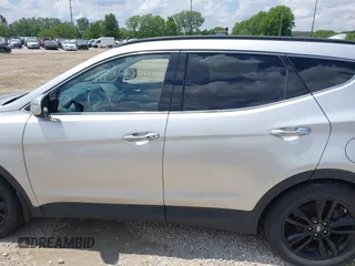 2013 Hyundai Santa Fe Sport z VIN 5XYZUDLA8DG055576, wystawiony jako IAAI lot #42392636 z przebiegiem 165 096 mil mil oraz . Historia ofert i sprzedaży dostępna na DreamBid. Obrazek 14.