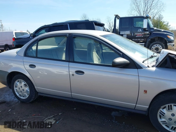 1999 Saturn SL z VIN 1G8ZH5281XZ376254, wystawiony jako IAAI lot #41857372 z przebiegiem 229 836 mil mil oraz . Historia ofert i sprzedaży dostępna na DreamBid. Obrazek 13.