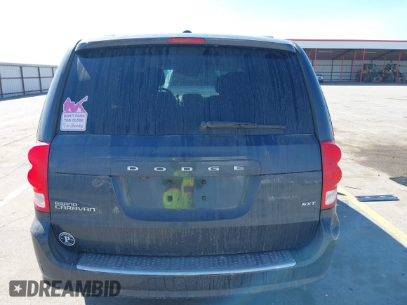 2014 Dodge Grand Caravan SXT with VIN 2C4RDGCG1ER167624, listed as a IAAI auction lot 41888822 with 202,729 mi miles and . Bid and sale history available at DreamBid. Image 16.