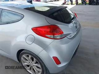 2012 Hyundai Veloster w/Gray Int z VIN KMHTC6ADXCU056898, wystawiony jako IAAI lot #40366687 z przebiegiem 137 161 mil mil oraz . Historia ofert i sprzedaży dostępna na DreamBid. Obrazek 14.