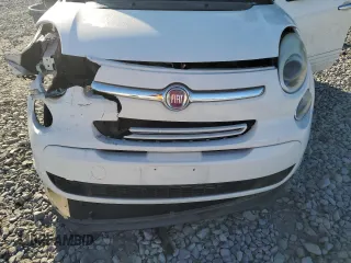 2014 FIAT 500L Easy z VIN ZFBCFABH4EZ023856, wystawiony jako Copart lot #76285024 z przebiegiem 131 343 mil mil oraz Szkoda całkowita • Salvage title. Historia ofert i sprzedaży dostępna na DreamBid. Obrazek 13.