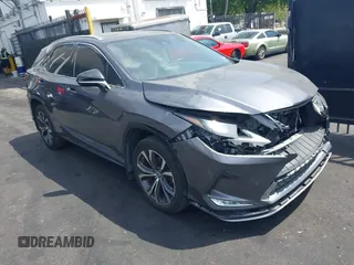 2022 Lexus RX with VIN 2T2HZMAAXNC228510, listed as a IAAI auction lot 41879028 with 87,595 mi miles. Bid and sale history available at carsss.com. Image 1.