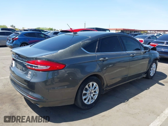 2017 Ford Fusion S with VIN 3FA6P0G70HR408265, listed as a IAAI auction lot 41978119 with 136,796 mi miles. Bid and sale history available at carsss.com. Image 4.