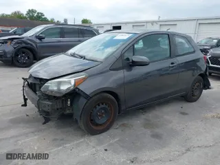 2015 Toyota Yaris L with VIN VNKJTUD32FA017299, listed as a IAAI auction lot 41862473 with 106,108 mi miles. Bid and sale history available at carsss.com. Image 2.