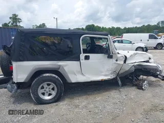 2005 Jeep Wrangler Unlimited with VIN 1J4FA44S65P368475, listed as a IAAI auction lot 42484636 with Not provided miles and . Bid and sale history available at DreamBid. Image 12.