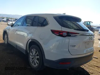 2016 Mazda CX-9 Sport with VIN JM3TCBBY0G0117159, listed as a IAAI auction lot 41302108 with 136,495 mi miles. Bid and sale history available at carsss.com. Image 3.